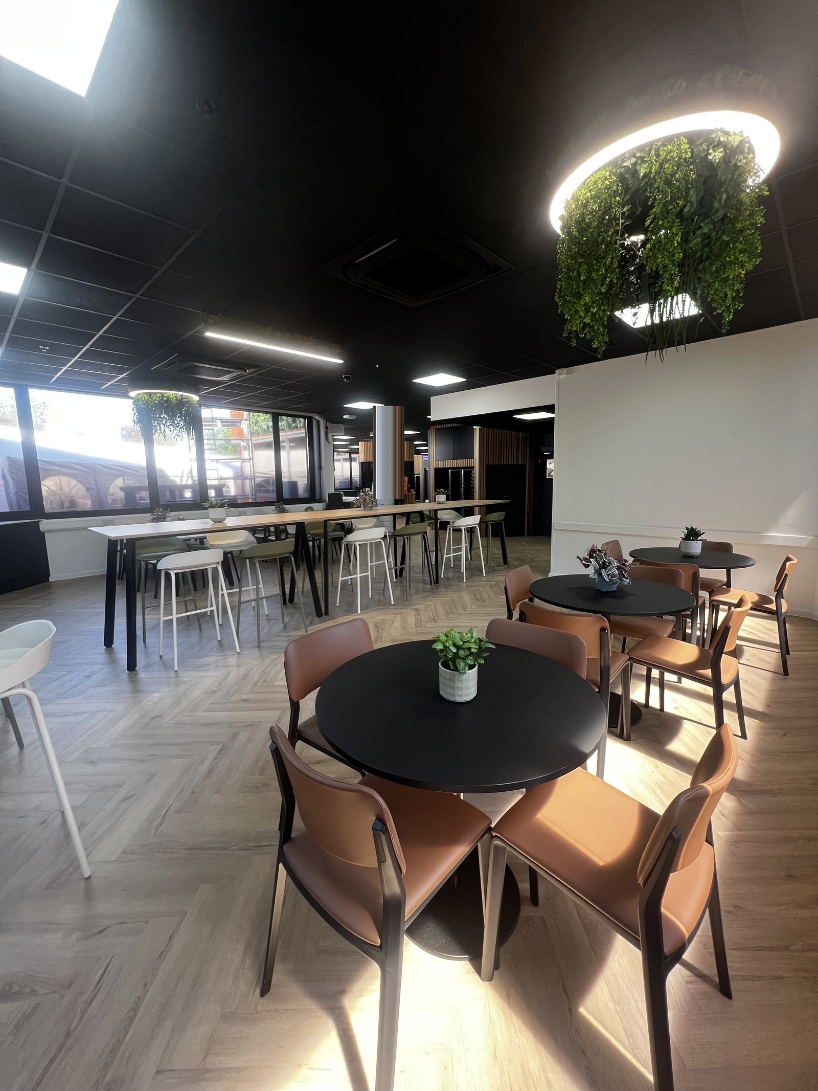 Completed 100 seat corporate canteen and breakout seating, redesigned by Aire Interiors